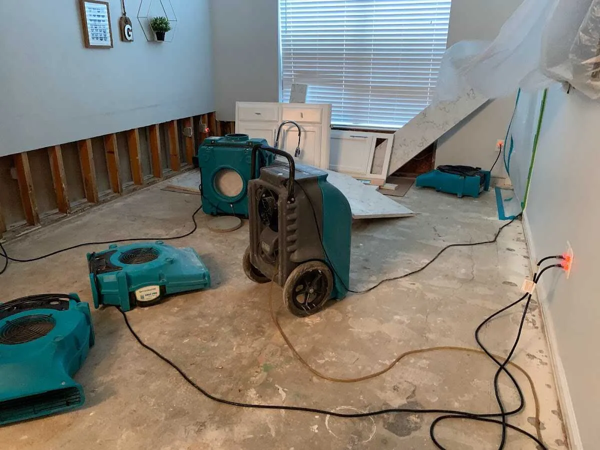 Dehumidifier in flood-cut room for Water Damage Restoration in Cherry Creek